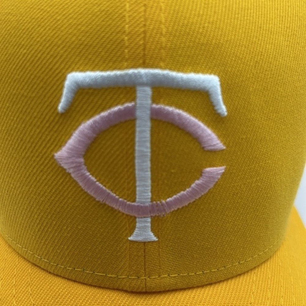 Minnesota Twins baseball hat.